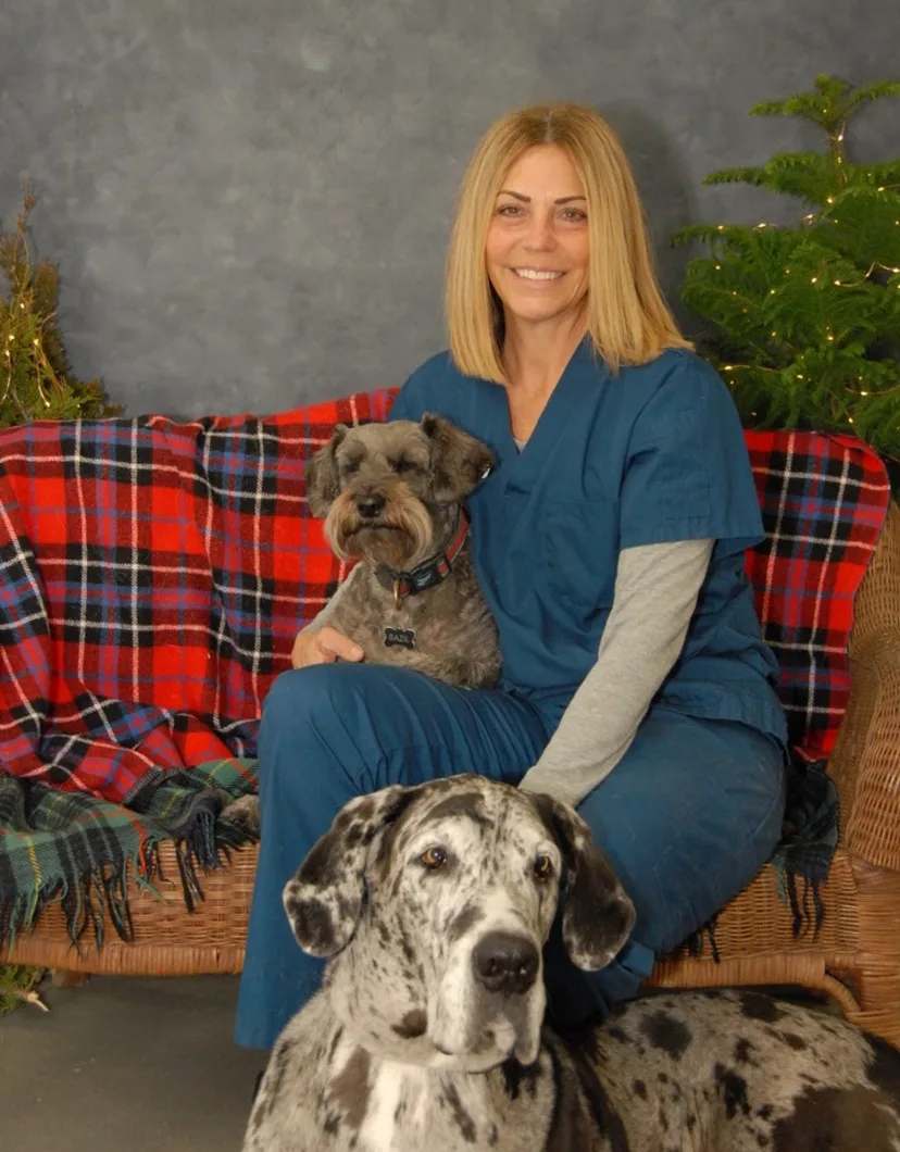 Jenny King holding dog.